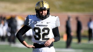 Vanderbilt place kicker Sarah Fuller warms up before the start of an NCAA college football game