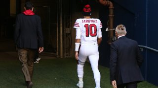 Quarterback Jimmy Garoppolo of the San Francisco 49ers exits the field.