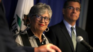 California Air Resources Board Chair Mary Nichols and California attorney general Xavier Becerra look on in this file photo during a news conference in 2019 in Sacramento, California. California Gov. Gavin Newsom, Nicholas and Becerra were responding to the Trump Administration’s plan to revoke California’s waiver to establish vehicle emissions standards for greenhouse gas emissions and standards to require manufacturers to sell zero emissions vehicles.