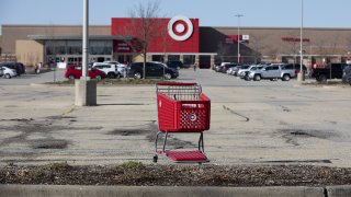 A shopping cart in the parking lot outside a Target store in Shorewood, Illinois,