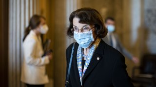 Senator Dianne Feinstein, a Democrat from California, wears a protective mask as she departs following a vote at the U.S. Capitol in Washington, D.C., U.S., on Tuesday, Nov. 17, 2020. President-elect Biden yesterday threw his weight behind House Democrats' proposals for a coronavirus relief bill, calling for aid to state and local governments, among other measures.