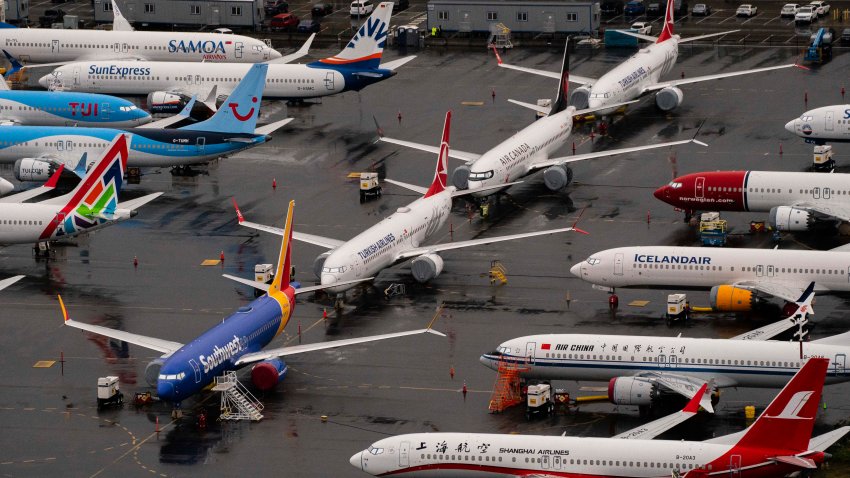 Boeing 737 Max airplanes sit parked at the company’s production facility on November 18, 2020 in Renton, Washington.