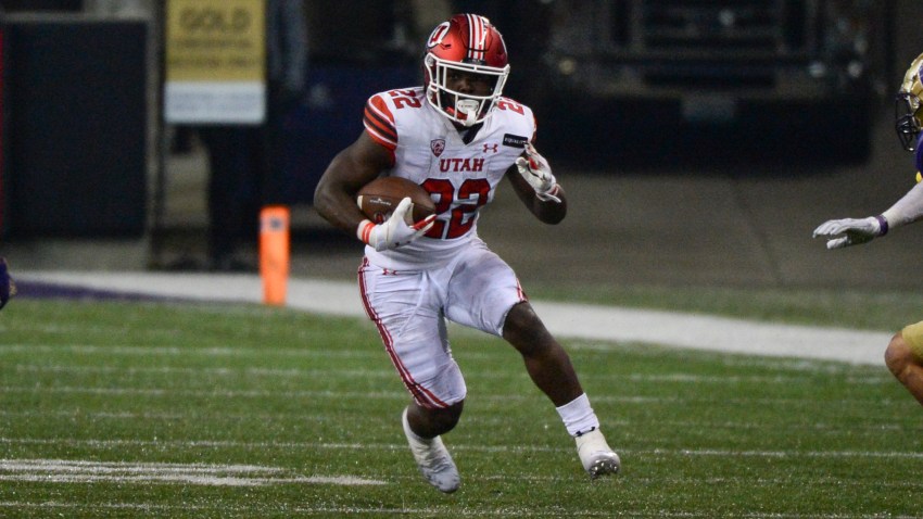 Utah Utes running back Ty Jordan (22) runs the ball during a PAC12 football game between the Utah Utes and the Washington Huskies on November 28, 2020, at Husky Stadium in Seattle, WA. (Photo by Jeff Halstead/Icon Sportswire via Getty Images)