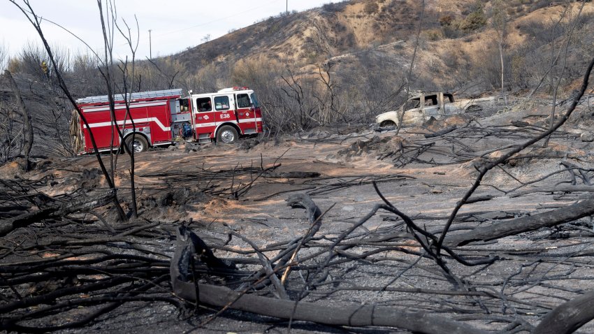 SILVERADO, CA – DECEMBER 08: Firefighters keep watch along a burned out area of Modjeska Canyon Road in Silverado, CA on Tuesday, December 8, 2020. The Bond Fire burned 6,686 acres and was 75% contained as of Tuesday morning. (Photo by Paul Bersebach/MediaNews Group/Orange County Register via Getty Images)