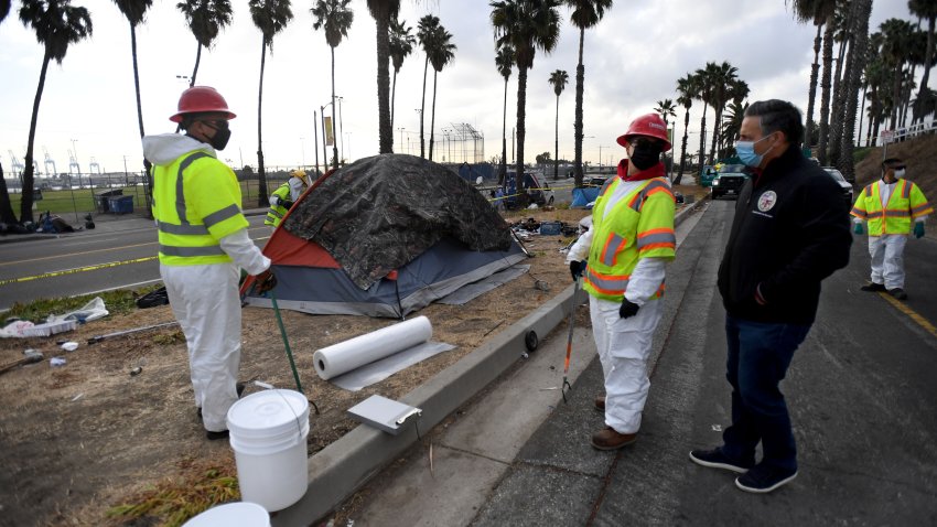 SAN PEDRO, CA – DECEMBER 10: A comprehensive cleanup took place at at Gulch Road and Harbor Blvd. in San Pedro on Thursday, December 10, 2020. This was the first city cleanup outside of a  Bridge Home zone since the pandemic started in March.  Los Angeles City Councilmember Joe Buscaino thanks the crew for all their hard work and assures them that the people have been offered shelter.  (Photo by Brittany Murray/MediaNews Group/Long Beach Press-Telegram via Getty Images)