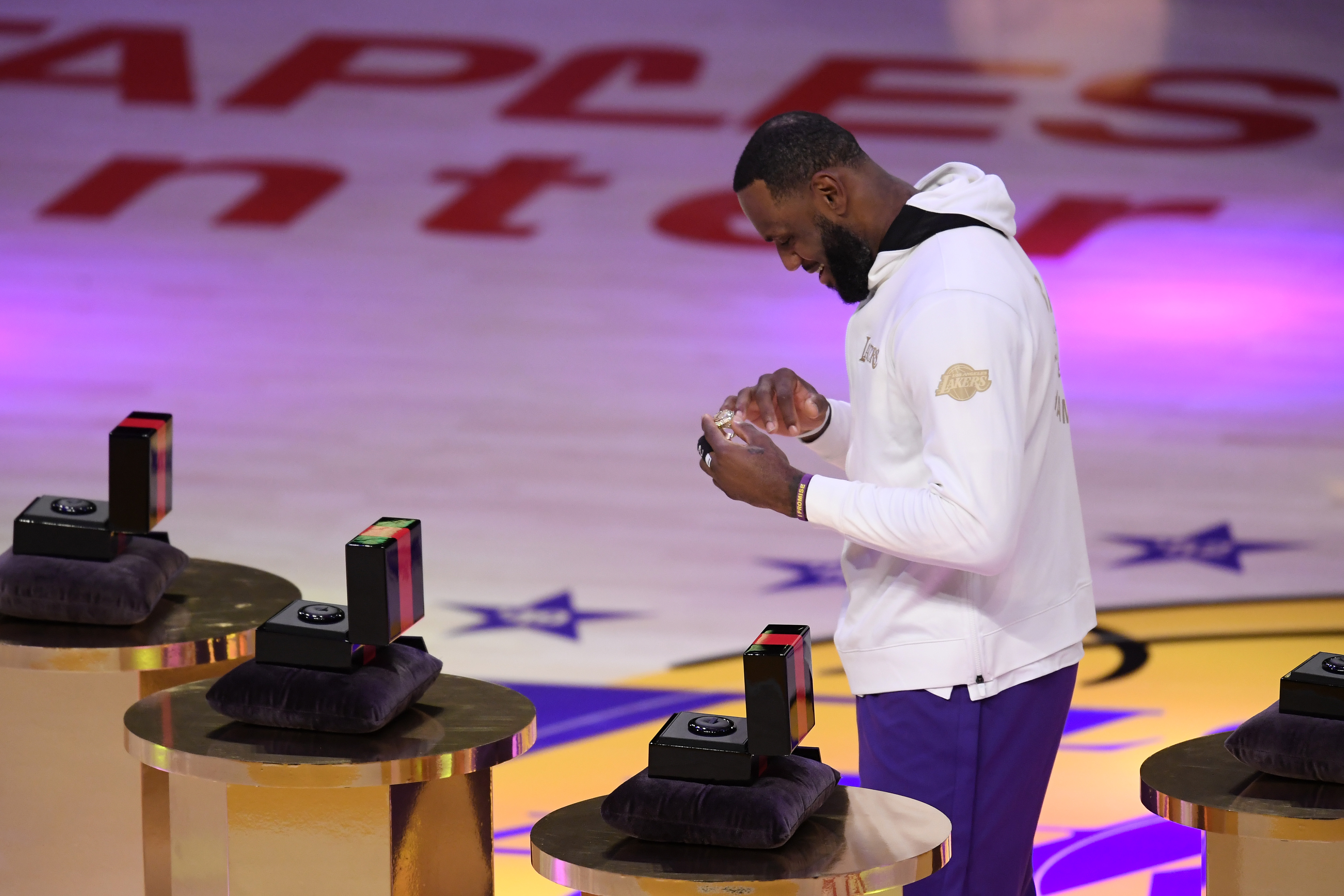 LeBron recieves his mickey mouse ring 