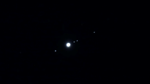 Image of Jupiter and 4 of its largest moons.