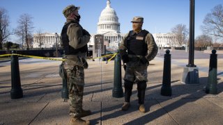 DC National Guard guardsmen stand outside the U.S. Capitol on January 07, 2021 in Washington, DC.