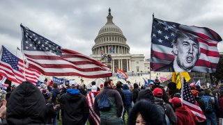 In this Jan. 6, 2021, file photo, former President Donald Trump's supporters gather outside the Capitol building.