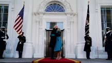 President Joe Biden hugs first lady Jill Biden