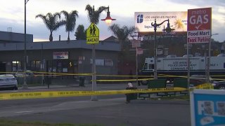 Police tape is pictured at the scene of a shooting in South LA's Florence-Firestone neighborhood.