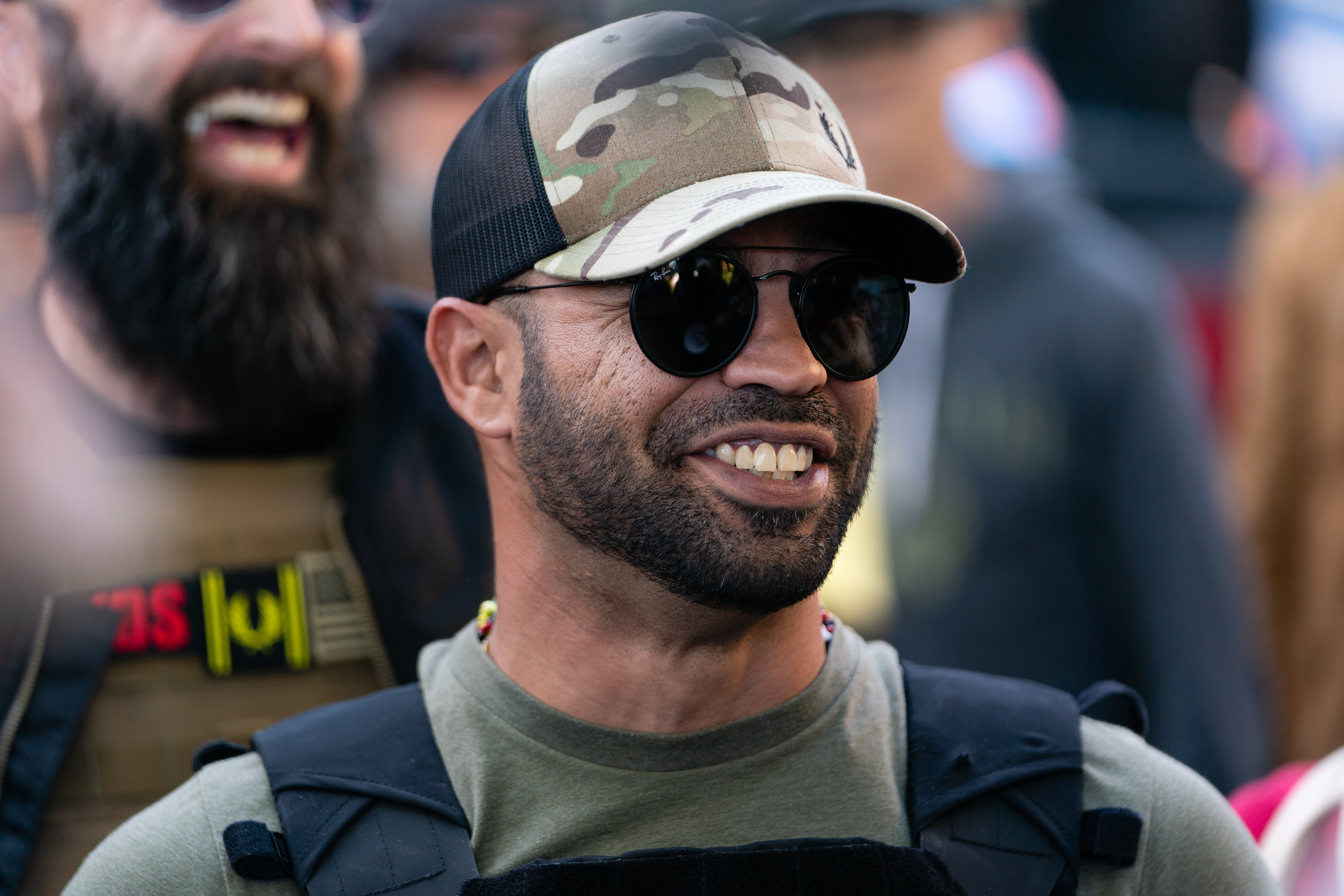 In this Nov. 18, 2020, file photo, Enrique Tarrio, leader of the Proud Boys, a far-right group, is seen at a "Stop the Steal" rally against the results of the U.S. Presidential election outside the Georgia State Capitol in Atlanta, Georgia.