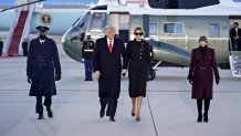 Outgoing President Donald Trump, center left, and U.S. First Lady Melania Trump arrive to a farewell ceremony at Joint Base Andrews, Maryland, Jan. 20, 2021. Trump had listed off a few accomplishments of his administration, including the creation of the Space Force, before he left for Mar-a-Lago.