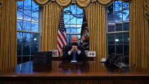 US President Joe Biden sits in the Oval Office