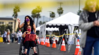 ANAHEIM, CA – JANUARY 13: People exit the COVID-19 vaccine super site set up at the north of the Toy Story Parking Lot at the Disneyland Resort in Anaheim, CA, on Wednesday, January 13, 2021. (Photo by Jeff Gritchen/MediaNews Group/Orange County Register via Getty Images)