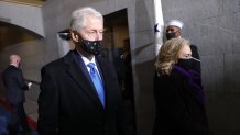Former President Bill Clinton arrives with former Secretary of State Hillary Clinton to the inauguration of Joe Biden on the West Front of the U.S. Capitol on Jan. 20, 2021 in Washington, D.C.