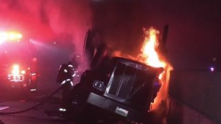 A big rig burns in a deadly freeway crash.