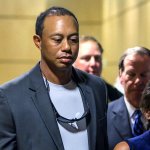 Golfer Tiger Woods leaves the Palm Beach County Courthouse, in Palm Beach Gardens, Fla., Friday, Oct. 27, 2017, after pleading guilty to a charge of reckless driving in connection with his May arrest for driving under the influence.