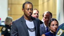 Golfer Tiger Woods leaves the Palm Beach County Courthouse, in Palm Beach Gardens, Fla., Friday, Oct. 27, 2017, after pleading guilty to a charge of reckless driving in connection with his May arrest for driving under the influence.