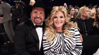 In this Nov. 13, 2019, file photo, Garth Brooks and Trisha Yearwood attend the 53rd annual CMA Awards at the Bridgestone Arena in Nashville, Tennessee.