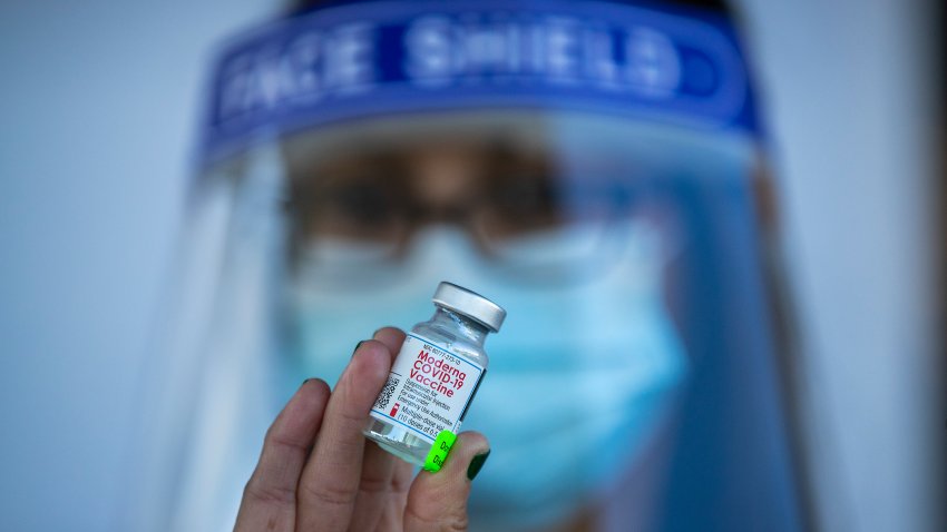 Anaheim, CA – January 28:  Sandra Perez, a licensed vocational murse at AltaMed Health Services, holds the Moderna COVID-19 vaccination.  Dickens-Jeffers gave the Moderna COVID-19 vaccination to former Los Angeles Mayor Antonio Villaraigosa, who wants to send a message to encourage other seniors to get their vaccination shots at AltaMed Health Services Medical and Dental Group in Anaheim Thursday, Jan. 28, 2021. (Allen J. Schaben / Los Angeles Times via Getty Images)