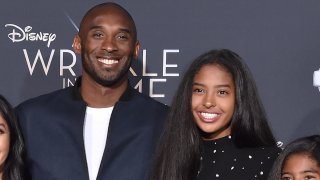 In this Feb. 26, 2018, former NBA player Kobe Bryant and Natalia Diamante Bryant arrive at the premiere of Disney's 'A Wrinkle In Time' at El Capitan Theatre in Los Angeles, California.