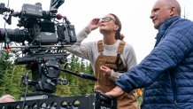 Director / actor Robin Wright (left) and director of photography Bobby Bukowski (right) on the set of LAND, a Focus Features release. Credit : Daniel Power / Focus Features