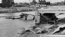 This 1938 image was taken at the confluence of the LA River and the Central Branch of the Tujunga Wash. The flood washed away the Lankershim Blvd Bridge by Universal City. This photo was taken on the south side of the river looking toward the northeast.