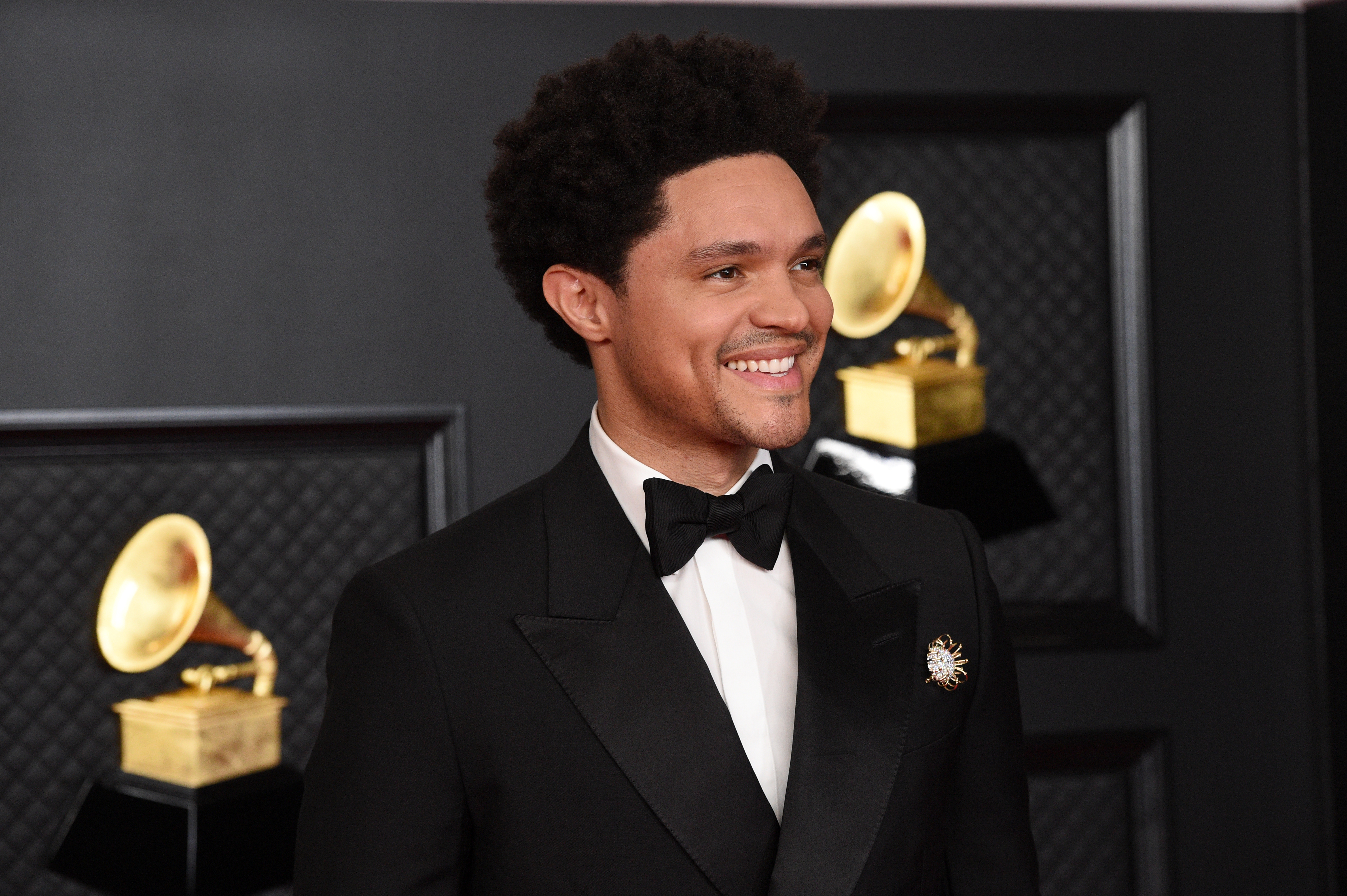 Host Trevor Noah arrives for the 2021 Grammy Awards in Los Angeles, California. (Photo by Kevin Mazur/Getty Images for The Recording Academy )