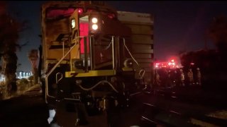 A railway employee was crushed between two trains in Orange County.