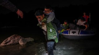 Hundreds of migrants from Honduras, Guatemala and El Salvador arrives in the U.S. after crossing the Rio Grande river from Mexico aboard, in Roma, Texas, United States on April 9, 2021.