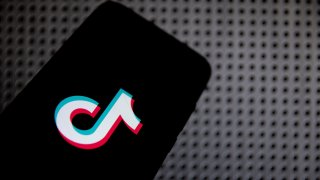 In this photo illustration TikTok logo is displayed on a smartphone screen in Athens, Greece on April 13, 2021