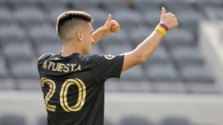 Eduard Atuesta #20 of Los Angeles FC reacts to the crowd after being named player of gane during the second half at Banc of California Stadium on April 24, 2021 in Los Angeles, California. Los Angeles FC and Seattle Sounders tied, 1-1. (Photo by Michael Owens/Getty Images)