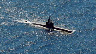 In this aerial photo taken from a maritime patrol aircraft of 800 Air Squadron of the 2nd Air Wing of Naval Aviation Center (PUSPENERBAL), the Indonesian Navy submarine KRI Alugoro sails during a search for KRI Nanggala, another submarine that went missing while participating in a training exercise on Wednesday, in the waters off Bali Island, Indonesia, Thursday, April 22, 2021. Indonesia's navy ships on Thursday were intensely searching for the submarine that likely fell too deep to retrieve, making survival chances for all the crew on board slim. Authorities said oxygen in the submarine would run out by early Saturday.