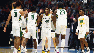 Davion Mitchell #45 of the Baylor Bears encourages his teammates during their game against the Houston Cougars in the Final Four semifinal game of the 2021 NCAA Men's Basketball Tournament at Lucas Oil Stadium on April 3, 2021 in Indianapolis, Indiana.