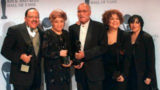 CORRECTS SINGING GROUP TO THE STAPLE SINGERS - FILE - This March 15, 1999 file photo shows the sibling group The Staple Singers, from left, Pervis, Cleotha, Pops, Mavis, and Yvonne at the Rock and Roll Hall of Fame induction ceremony in New York. Yvonne Staples, whose voice and business acumen powered the success of her family's Staples Singers gospel group, has died at age 80. The Chicago funeral home Leak and Sons says that she died Tuesday, April 10, 2018 at home in Chicago.