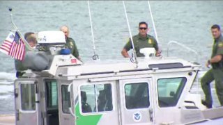 Border Patrol agents on boat as part of Marine Unit