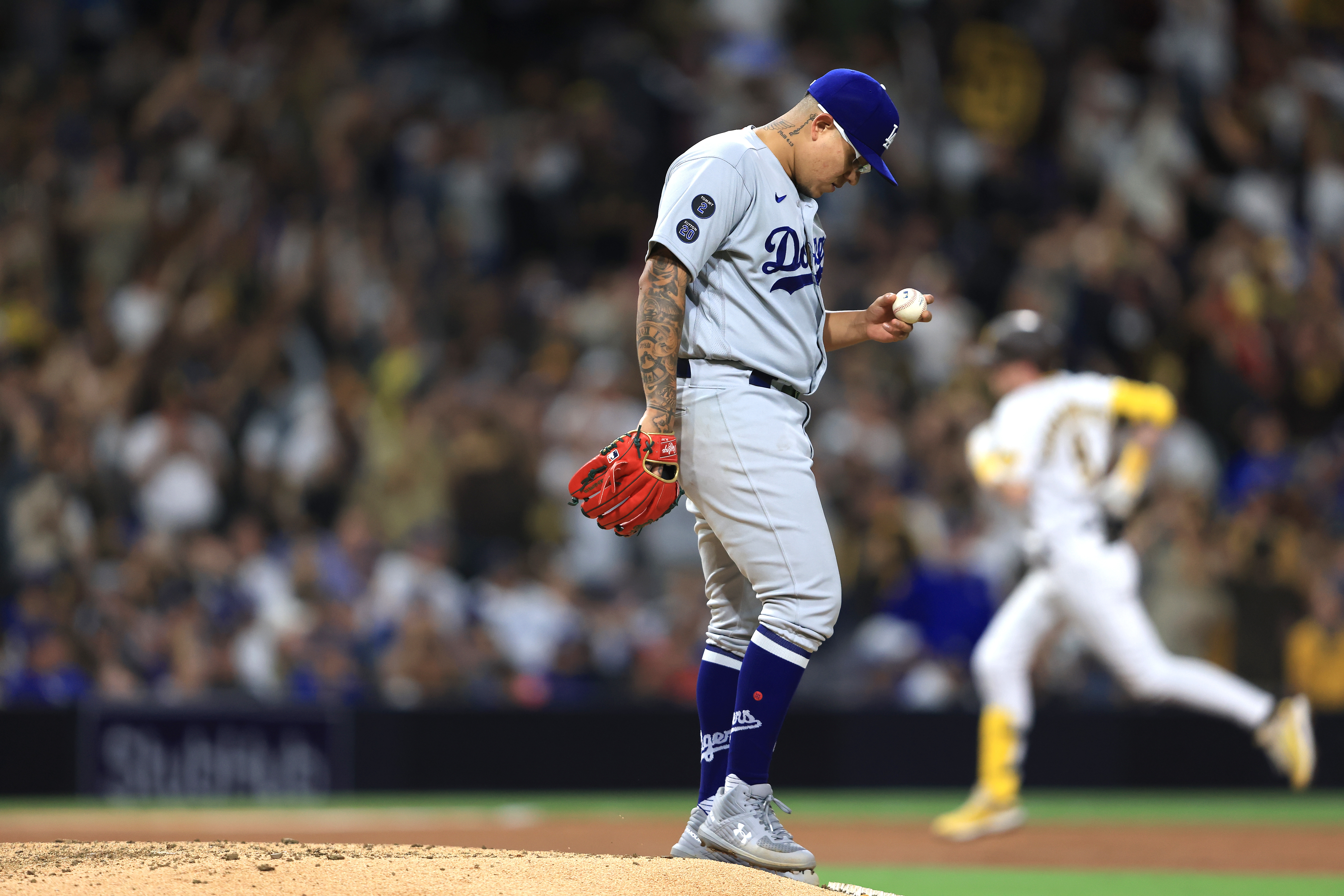 Jake Cronenworth of the San Diego Padres runs to first base during News  Photo - Getty Images