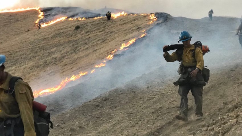 A brush fire burns in southern Kern County.