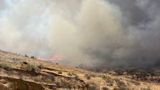 A brush fire burns in Hesperia.