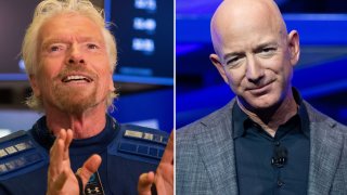 Virgin Galactic’s Sir Richard Branson (L) and Blue Origin’s founder Jeff Bezos.