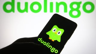 In this photo illustration an Duolingo logo of a language-learning website and mobile app is seen on a smartphone.