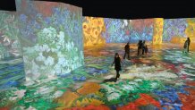 Floral still life paintings cover the walls at "Beyond Van Gogh" exhibit on April 12, 2021 in Miami. (Gayaman Visual Studio)