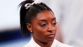 Simone Biles watches team all-around final