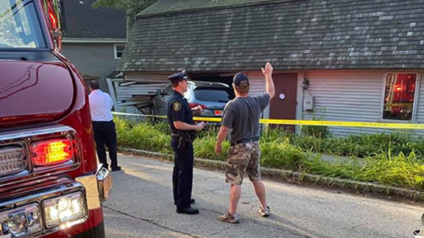 A car crashed into a house in Hingham, Massachusetts, on July 15, 2021.
