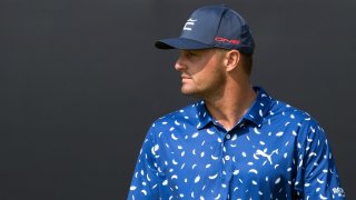 Jul 13, 2021; Sandwich, England, GBR; Bryson DeChambeau looks over the 18th green during a practice round for the Open Championship golf tournament at Royal St. George's Golf Course.
