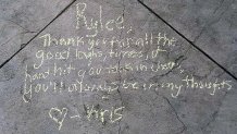 Messages in honor of Rylee Goodrich, 19, and Anthony Barajas, 18, were left outside a movie theater at The Crossings mall in Corona.