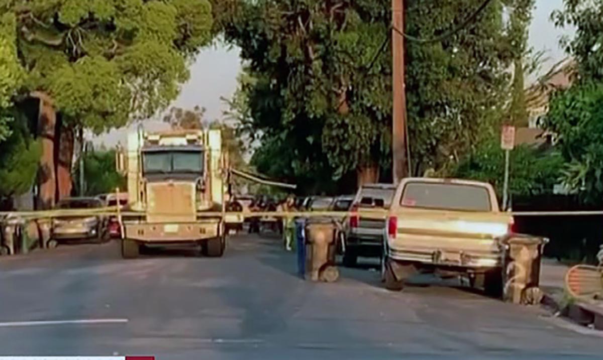 Cars, buildings and an LAPD bomb squad truck, seen here before the blast, were damaged in an explosion during an illegal fireworks bust in a South LA neighborhood Wednesday June 30, 2021.