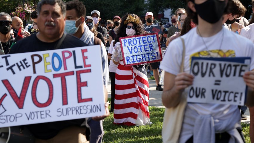 WASHINGTON, DC – AUGUST 28:  Voting rights activist Regina Cosio of Syracuse, New York, dresses as “Ms Liberty” as she participates in a pre-march rally during a March On For Voting Rights event at McPherson Square August 28, 2021 in Washington, DC. Activists gathered in Washington to mark the 58th anniversary of the 1963 March On Washington, where Dr. Martin Luther King delivered his “I Have a Dream” speech, and urged the Senate to pass voting rights legislations.  (Photo by Alex Wong/Getty Images)