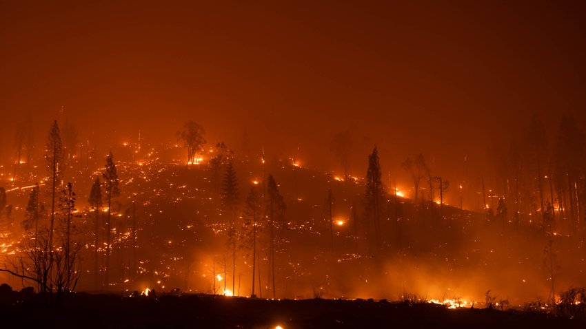 A hillside burns during the Caldor Fire along Mormon Emigrant Trail near Pollock Pines, California, U.S., on Tuesday, Aug. 17, 2021. Sharp, dry winds have raised the wildfire threat across Northern California, which is suffering through one of its worst years for blazes in history. Photographer: David Odisho/Bloomberg via Getty Images